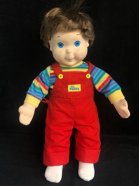 This 21-inch doll was a cute replica of young boy, complete with a baseball cap, overalls, sneakers and a bowl-cut hairstyle for his rooted hair. . My buddy doll original